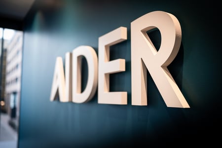 AIDER Logo on office wall