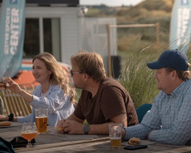 Three people relaxing at the Sola Strand Hotel