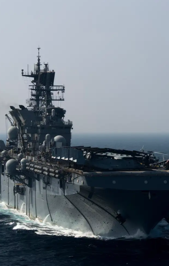 A large navy ship at sea